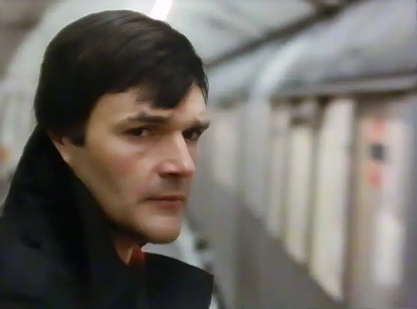 Doug Alker is shown here at the start of the film somewhat taken by Jean Massieu's presence further down the tube station platform. He is looking quite puzzled and maybe even a little concerned. Maybe he thinks the past nightmares the Deaf have suffered have not yet been resolved? A tube train has entered the station and it forms the background which is blurred.