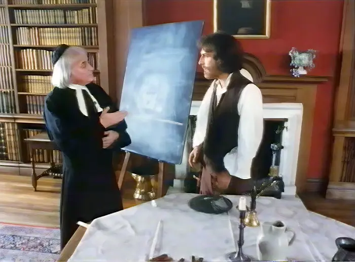Edward Jones and Paddy Ladd in a scene from Picture in the Mind. Jones is on the left laying Sicard and Ladd o the right as Massieu. They are using a blackboard in order to denote words and their spelling.